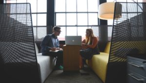 Man and a woman sitting together HR Consulting