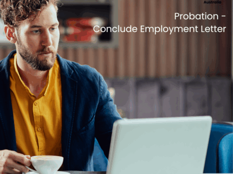Serious looking manager looking at laptop preparing conclude employment letter.