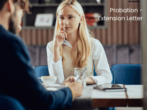 Caucasian blonde businesswoman dressed smart casual discussing with her probation extension with her male manager.