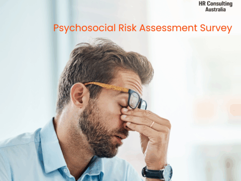 Business man, headache and sick, tired or fatigue in office while working. Employer wants to complete Psychosocial Risk Assessment Survey